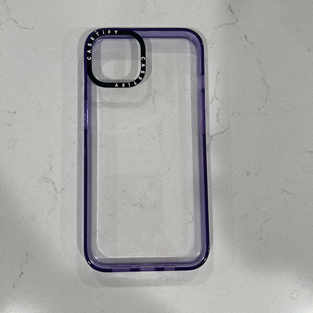 Casetify clear case with purple trim (iPhone 14)